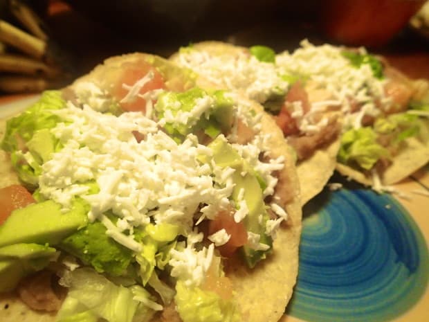 Tostadas are a favorite of Central American street vendors- they are cheap and easy to make. That combination also makes them a great thing to experiment with in your own kitchen.