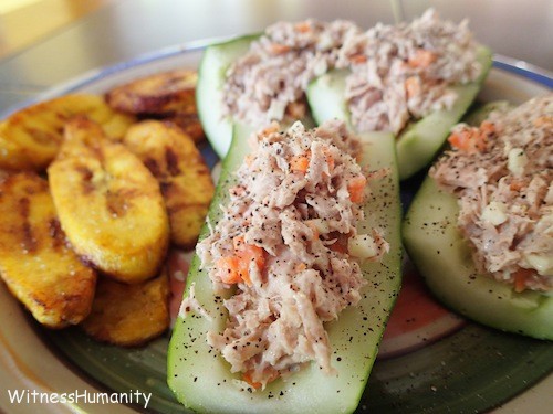 Cucumber stuffed with tuna fish and plantains on the side is a super easy lunch for travelers!
